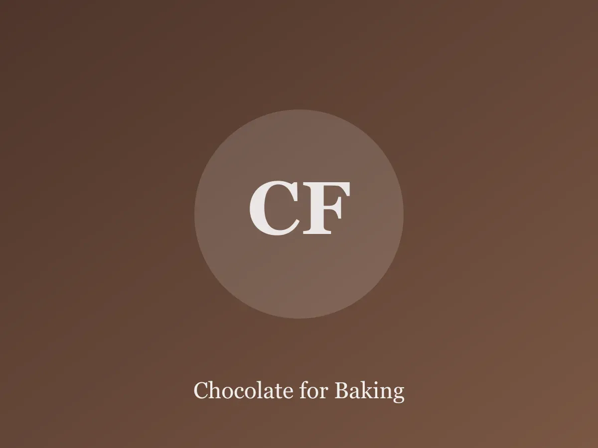 Assorted chopped baking chocolate bars and cocoa powder on a counter