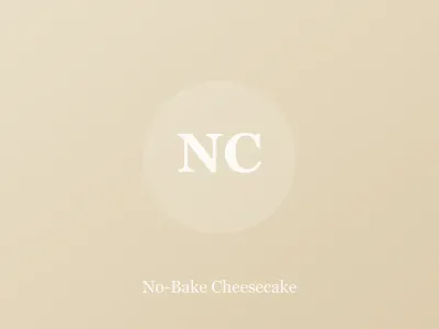 Whole no-bake cheesecake with graham cracker crust topped with fresh strawberries