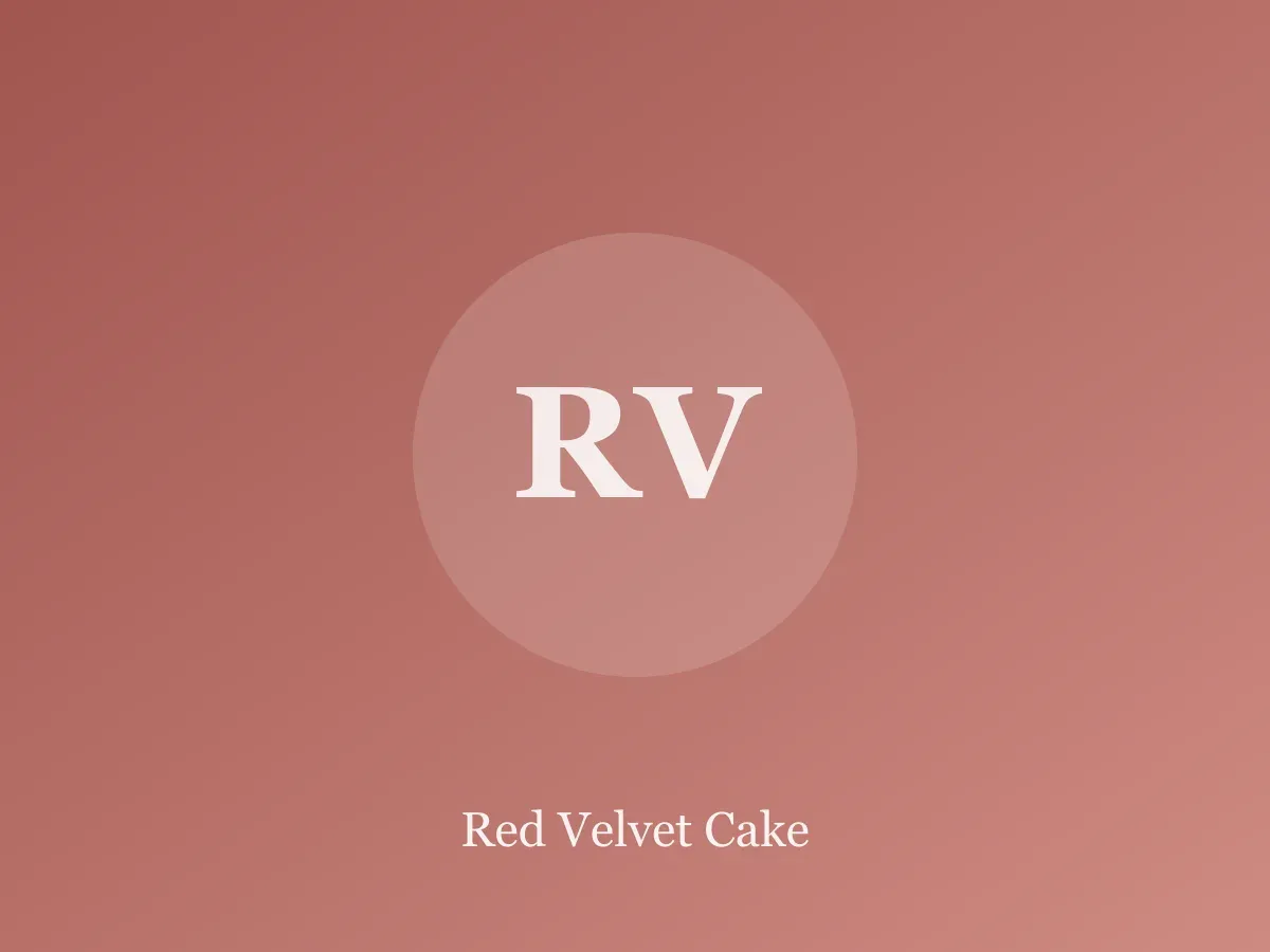 Slice of red velvet layer cake with white cream cheese frosting