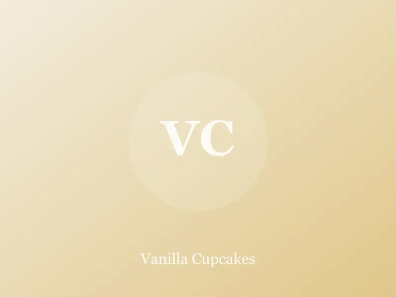 Vanilla cupcakes with swirled buttercream on a cooling rack